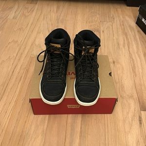 Men’s Levi’s black boots with tan soles